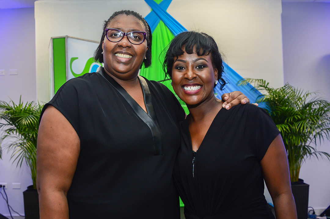 Vice President, Group Marketing of Sagicor Jamaica, Ingrid Card and Project Coordinator, Mrs. Alysia White smile exuberantly at the opening of Sagicor Group’s Inspire Project cocktail event at the new Toyota Showroom on Friday, October 7, 2016.