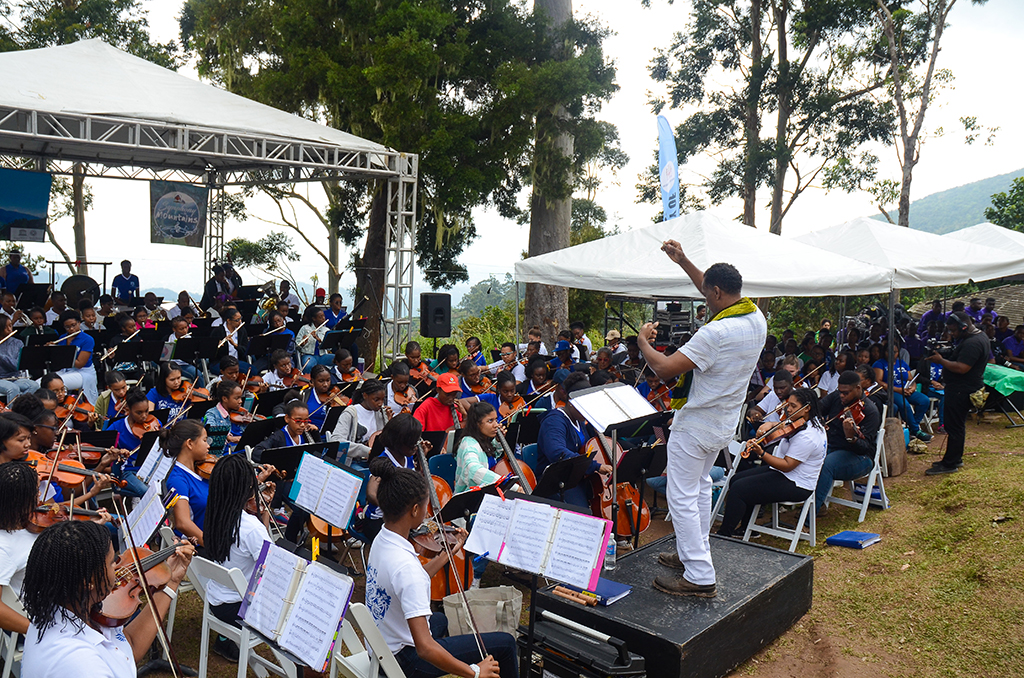 Led by instructor Steven Woodham, the combined forces of the Immaculate High School Symphony Orchestra and Glee Club, KC Chapel Choir, JDF Military Band and Master Drummers-Charles Town, treated patrons at Symphony in the Mountains to a day of great renditions.