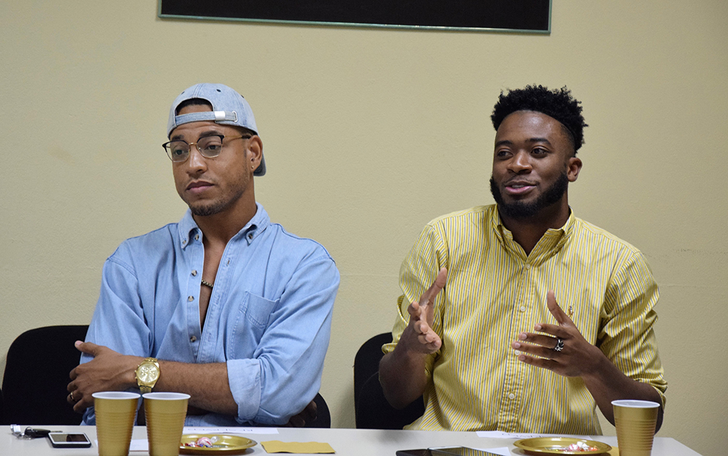 Rohan Perry better known ‘QuitePerry’ [left] and Joel Nomdarkham shares experiences of being cyber bullied at the recently cyber Love campaign at the University of Technology. Jamaica