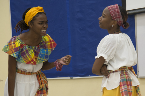 Students Alexia Grandison and Courtni-Ann Gilzeane present a cultural item at the 6th Hilory Pamela Kelly distinguished lecture. series at the University of Technology, Jamaica on Thursday January 23, 2020. Photo by Andrew P. Smith for UJS News