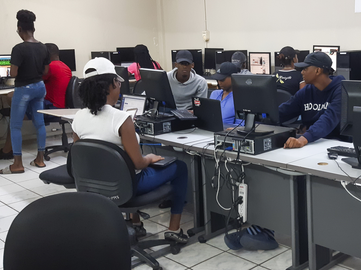 Students of University of Technology, Jamaica (UTech) work on assignments in a computer lab at the Papine Campus on October 24,2019. With the outbreak of COVID-19, students will have to adhere to social distancing and other guidelines. File photo by Dannielle Mullings for UJS News